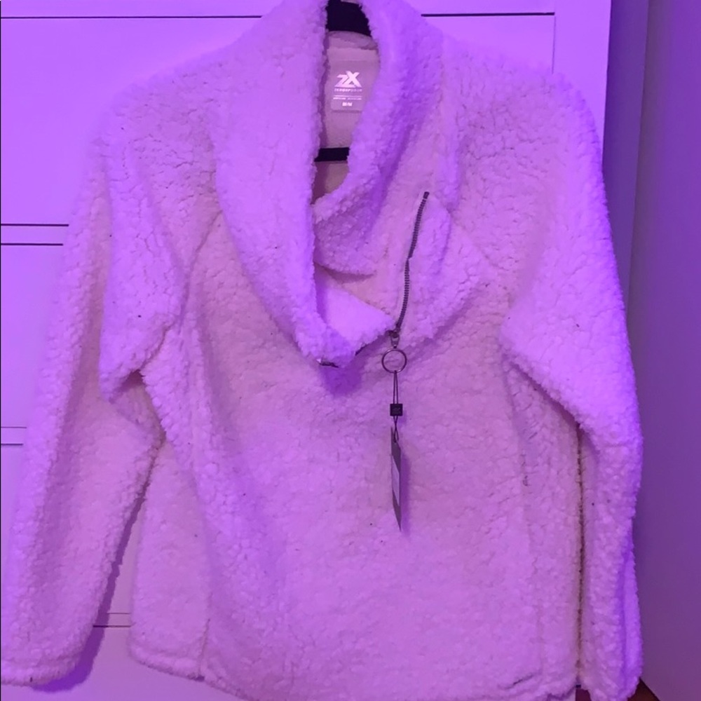 A white Sherpa sweater